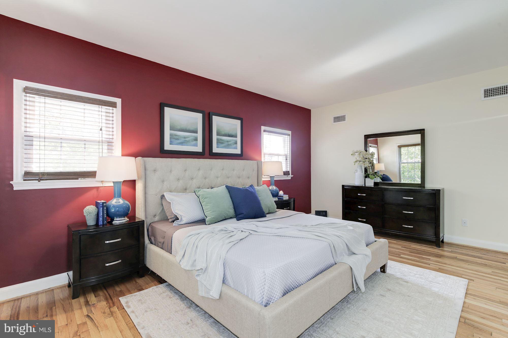 4200 River Road Northwest Washington, DC 20016 - Photo 11 of 30 a bedroom with a bed and a dresser