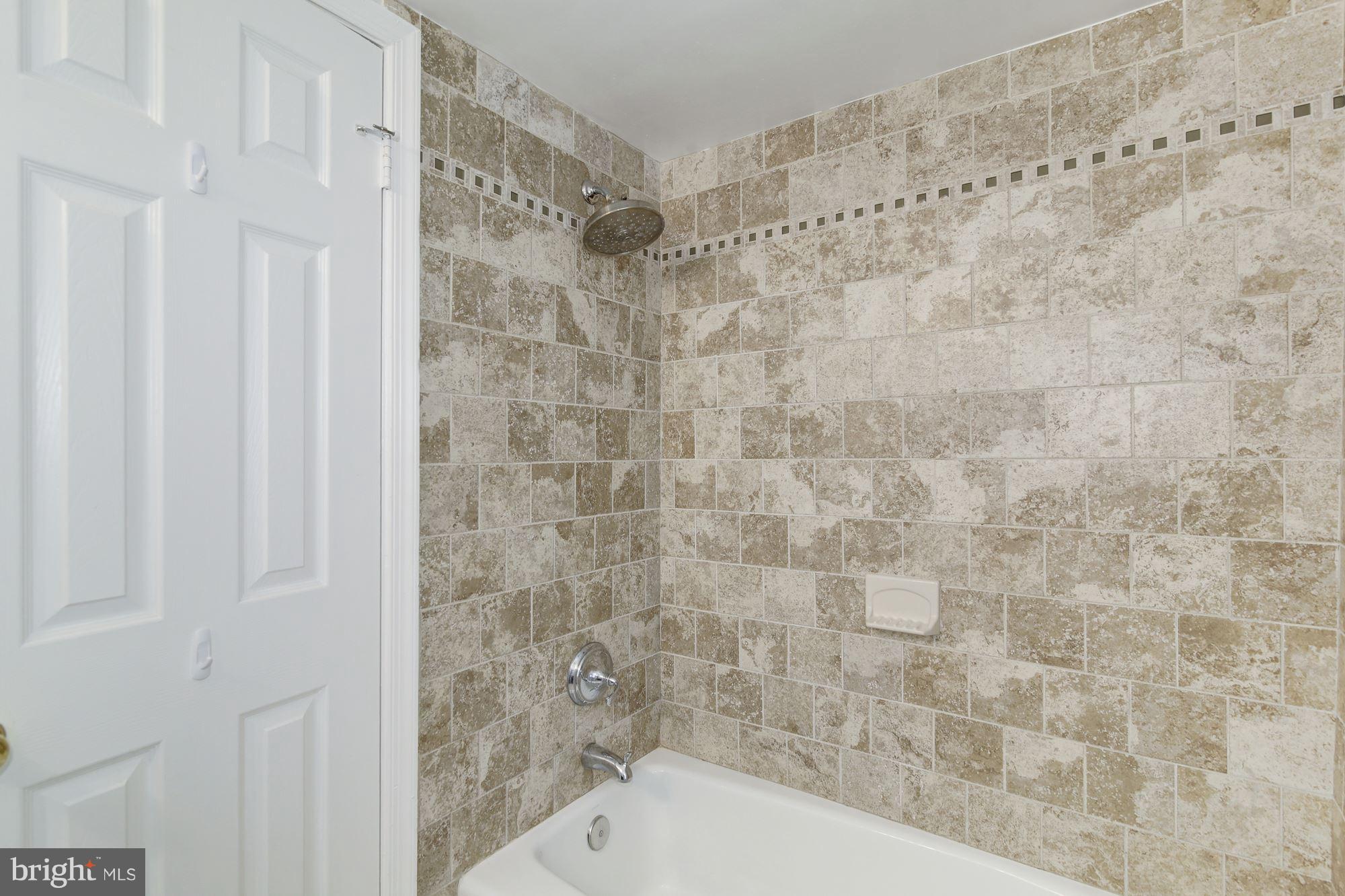 4200 River Road Northwest Washington, DC 20016 - Photo 18 of 30 a bathroom with a shower
