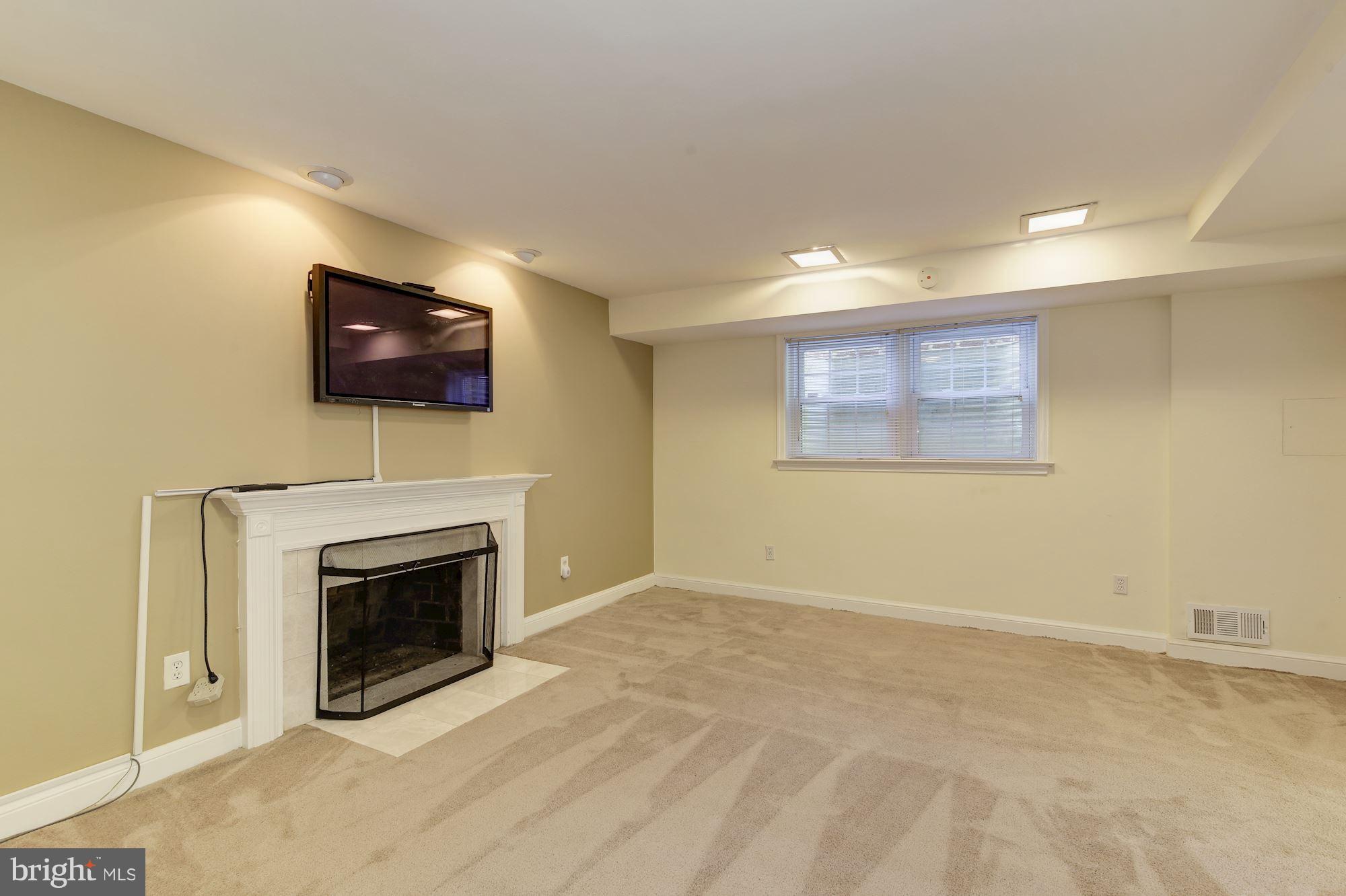 4200 River Road Northwest Washington, DC 20016 - Photo 19 of 30 a view of an empty room with a fireplace