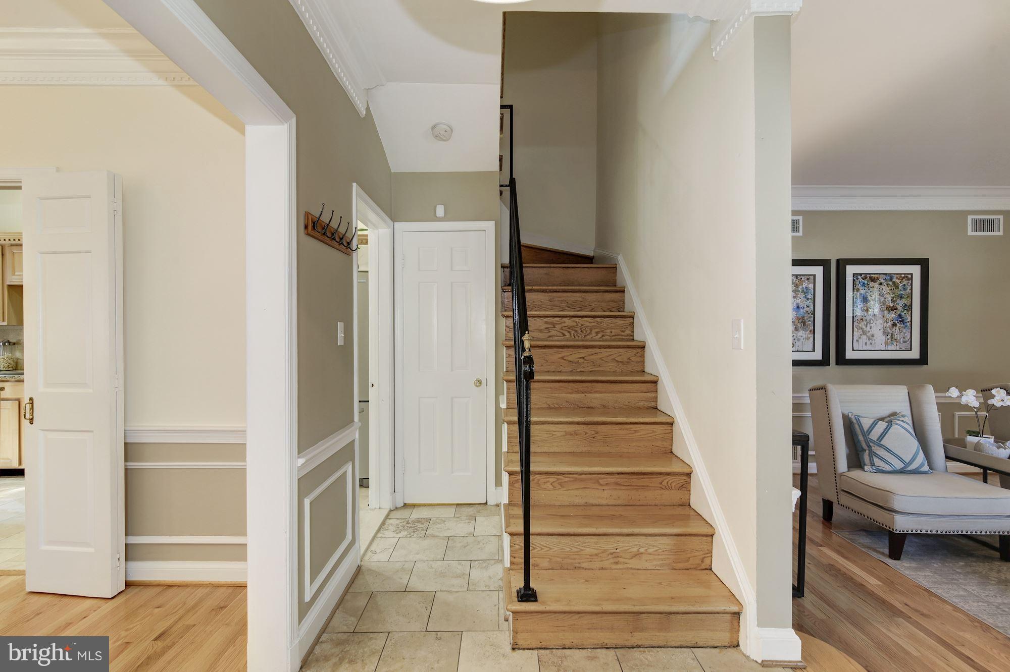4200 River Road Northwest Washington, DC 20016 - Photo 2 of 30 a view of a hallway with wooden floor and entryway