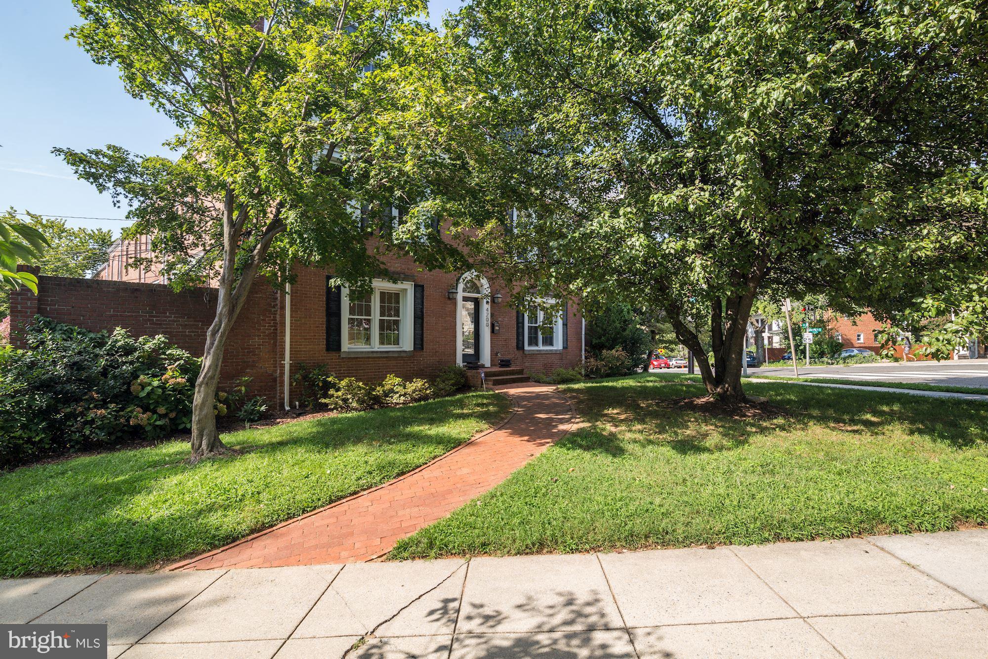 4200 River Road Northwest Washington, DC 20016 - Photo 26 of 30 a front view of a house with garden