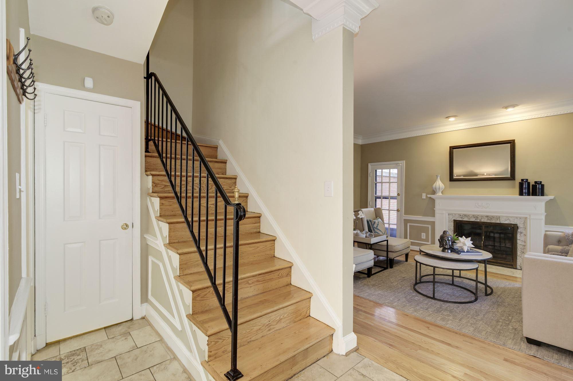 4200 River Road Northwest Washington, DC 20016 - Photo 3 of 30 a view of entryway livingroom and hall with wooden floor