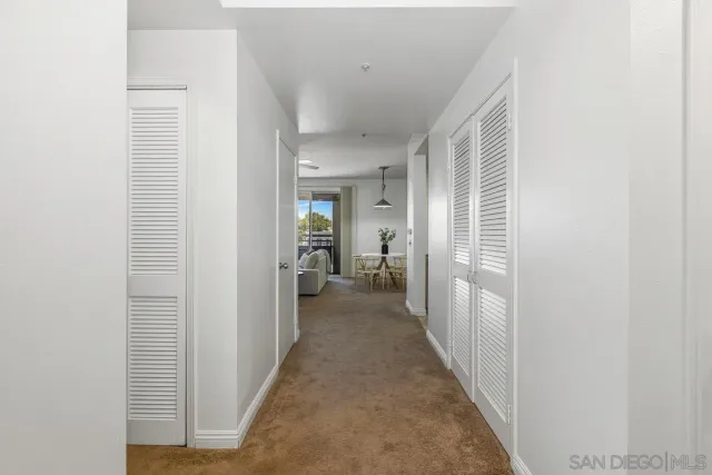 a view of hallway with livingroom