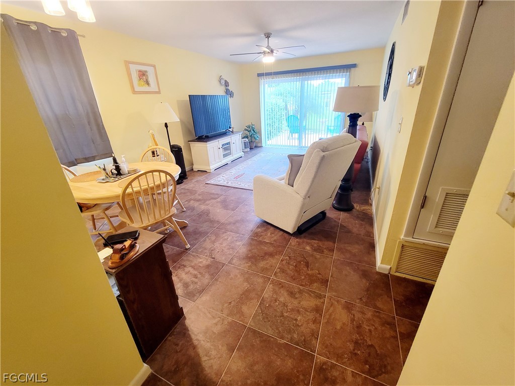 2206 East 6th Street Lehigh Acres, FL 33936 - Photo 14 of 30 a living room with furniture and a window