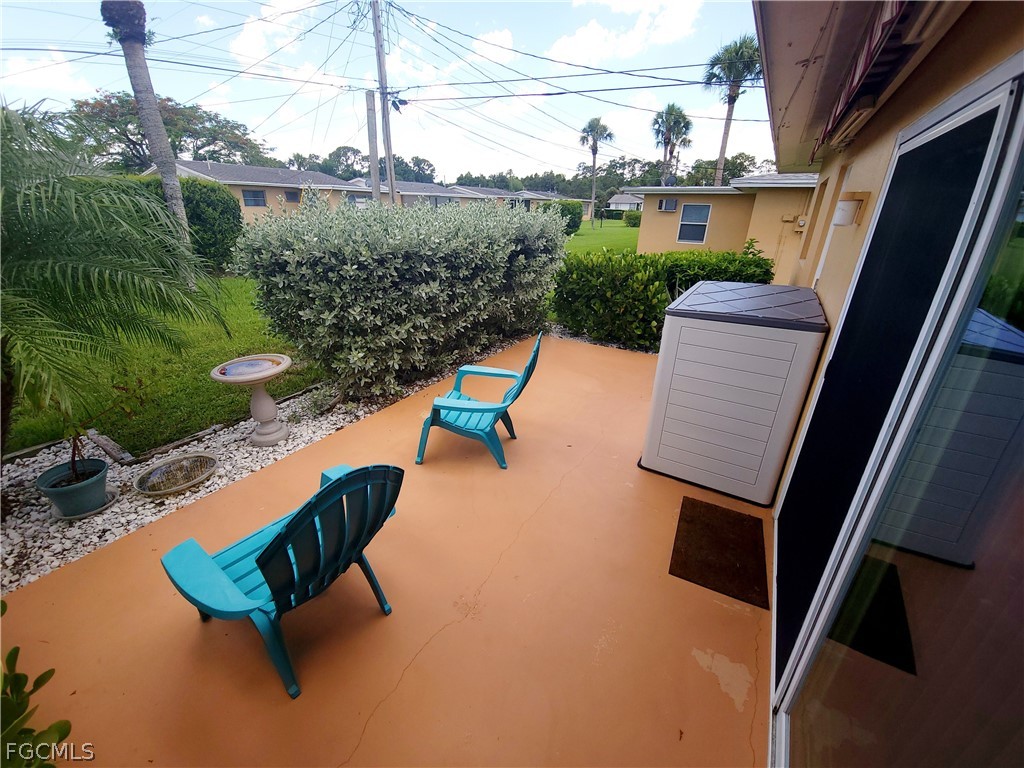 2206 East 6th Street Lehigh Acres, FL 33936 - Photo 25 of 30 a view of swimming pool with a patio
