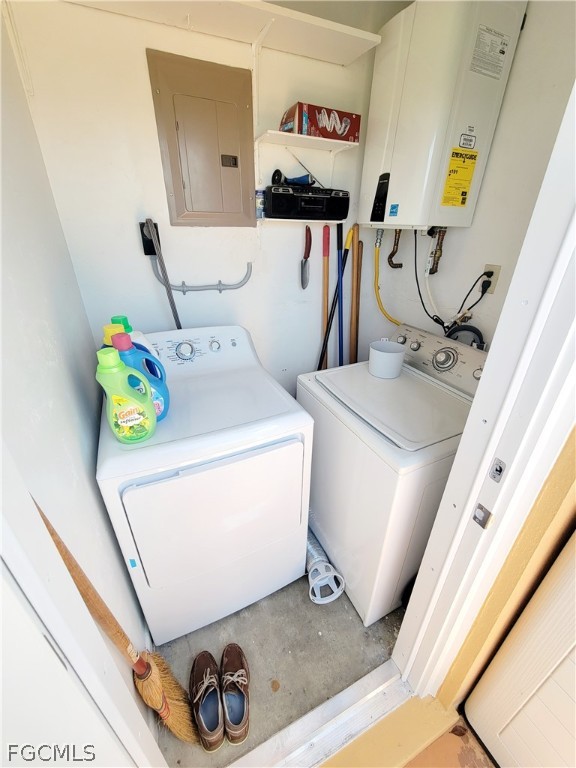 2206 East 6th Street Lehigh Acres, FL 33936 - Photo 29 of 30 a utility room with dryer and washer