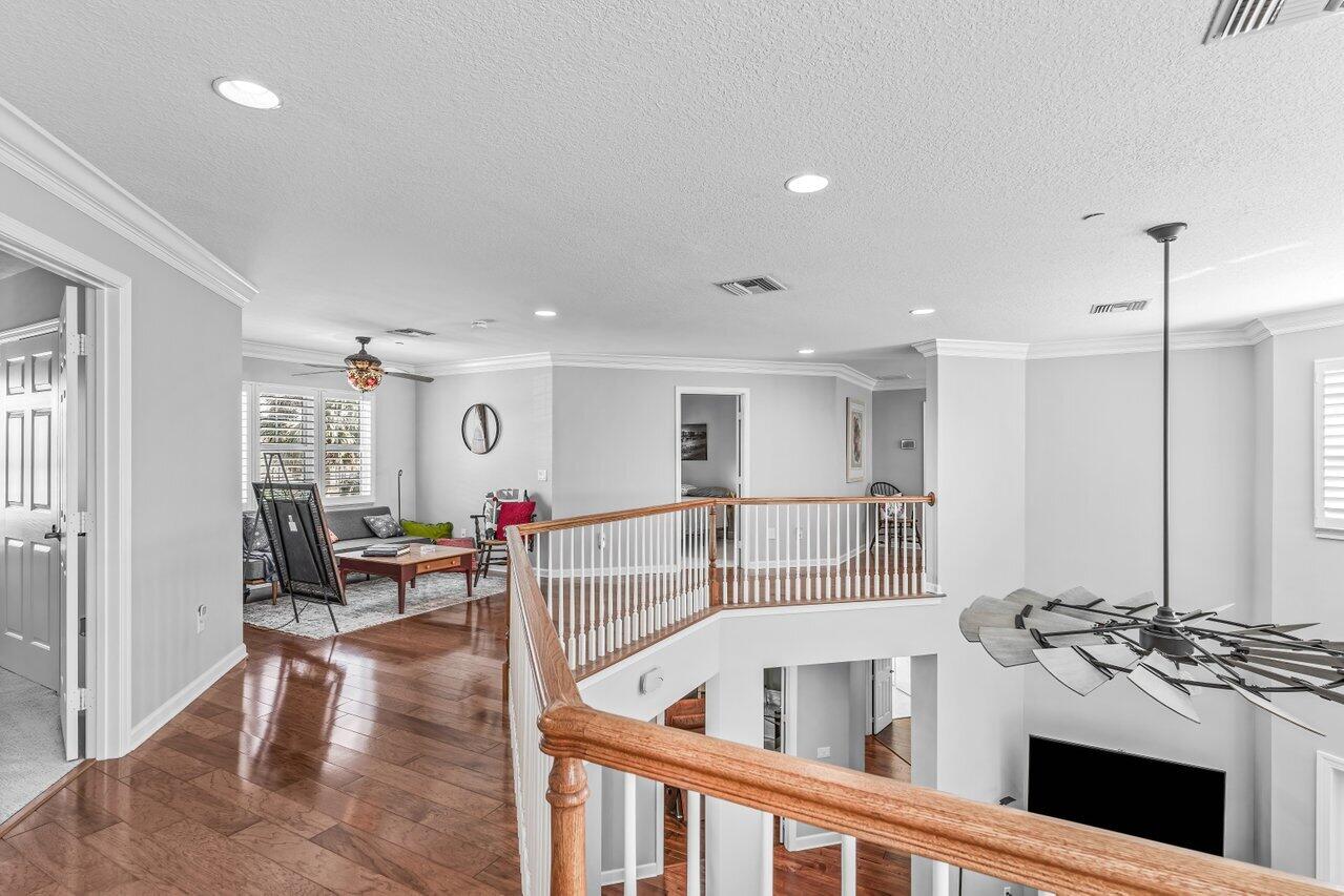 1802 Southwest Trailside Path Stuart, FL 34997 - Photo 19 of 57 a kitchen with stainless steel appliances granite countertop a stove and a sink with cabinets