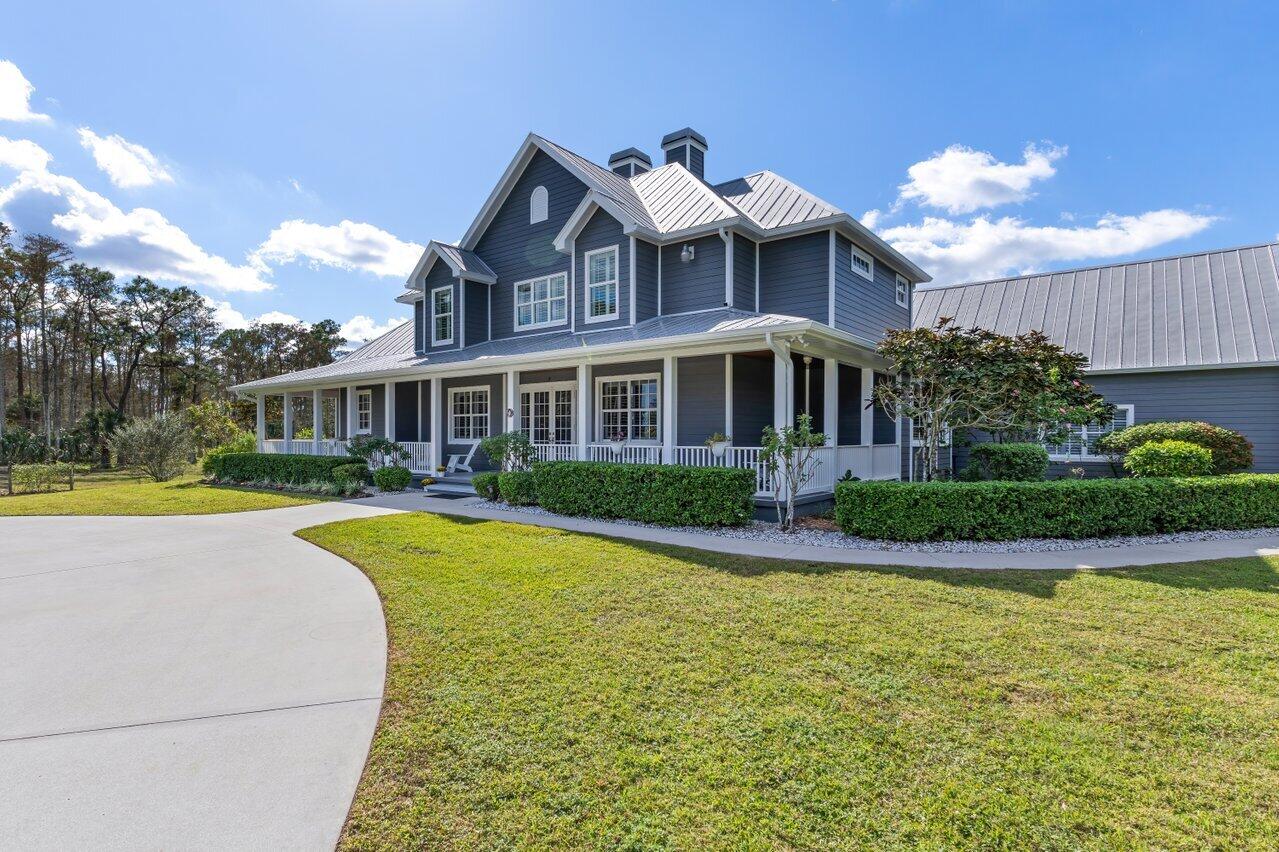 1802 Southwest Trailside Path Stuart, FL 34997 - Photo 53 of 57 a view of a house with swimming pool and yard