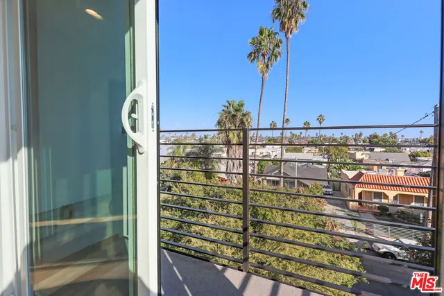 a view of a balcony with city view