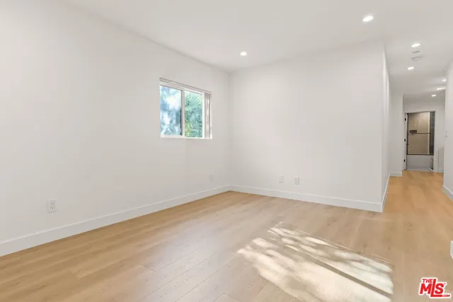 an empty room with a natural light