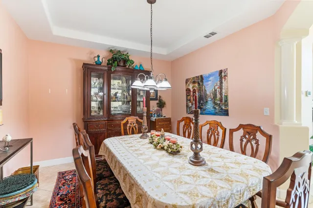 a kitchen with counter top space cabinets and appliances