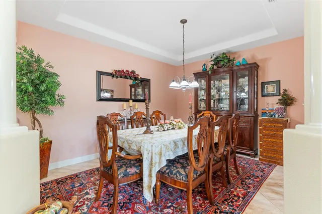 a kitchen with a sink cabinets and stainless steel appliances