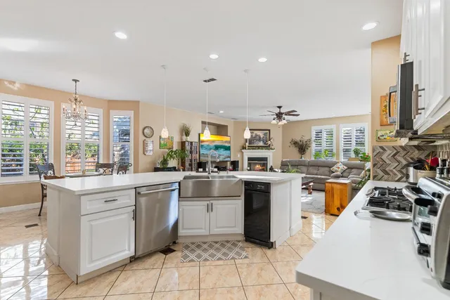 a view of a workspace with furniture and a workspace