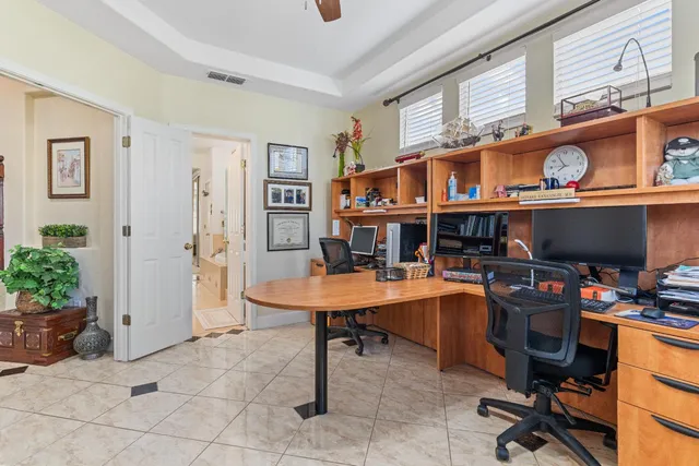 a view of a workspace with furniture and toys