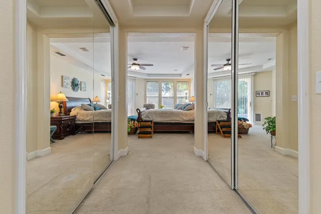 a bed room with a bed and a lamp