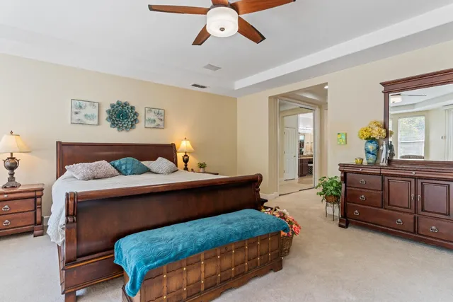 a bathroom with a sink vanity and a mirror