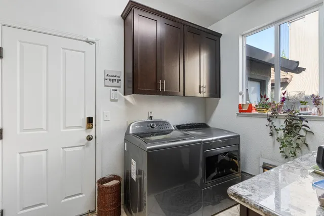 a view of a swimming pool with a patio