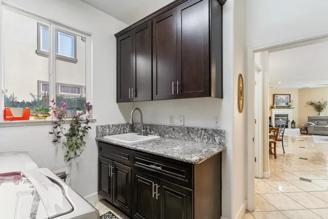 a swimming pool with patio outdoor seating and yard
