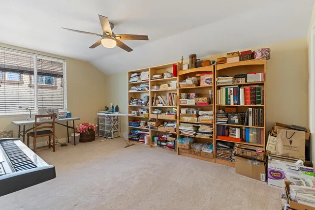 a view of a swimming pool with a yard