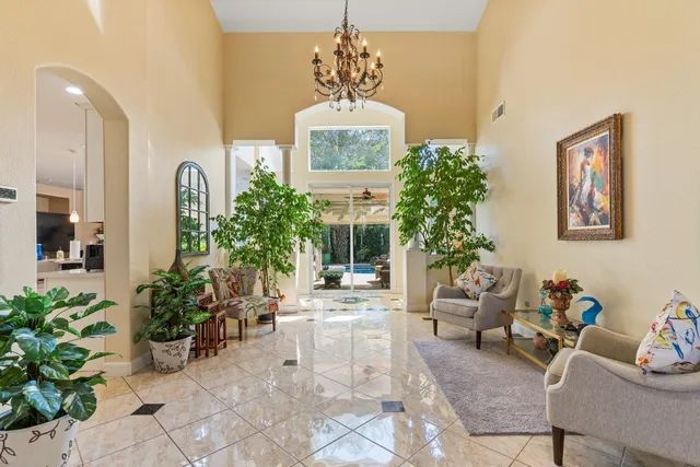 a view of a dining room and a table and chairs