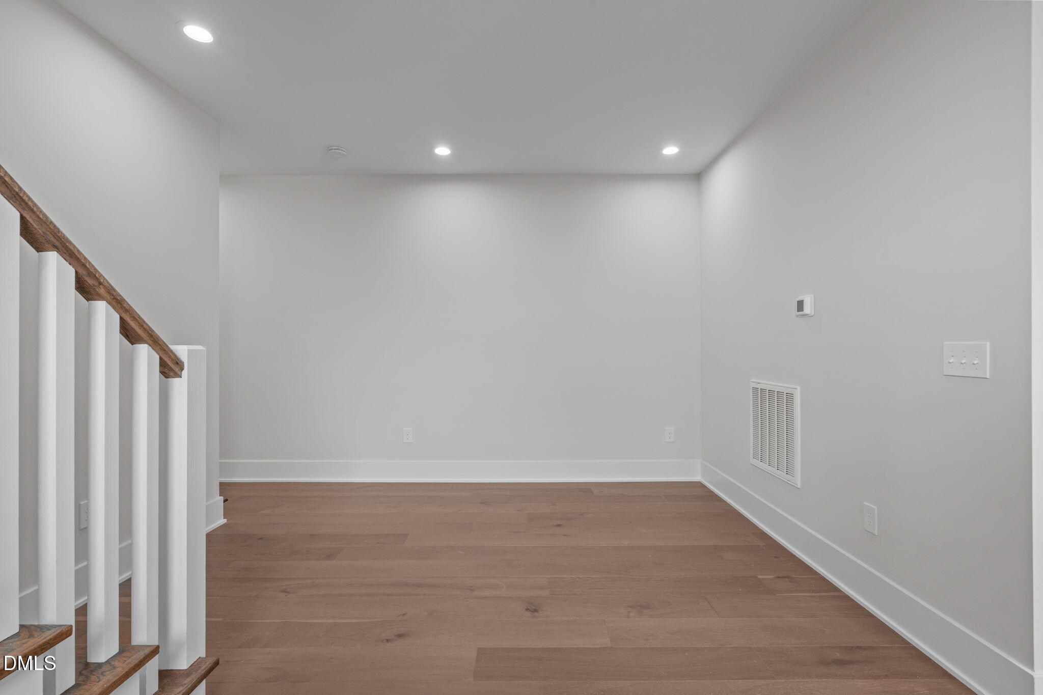 639 Conover Road, Unit A Durham, NC 27703 - Photo 11 of 49 a view of room with stairs and a window
