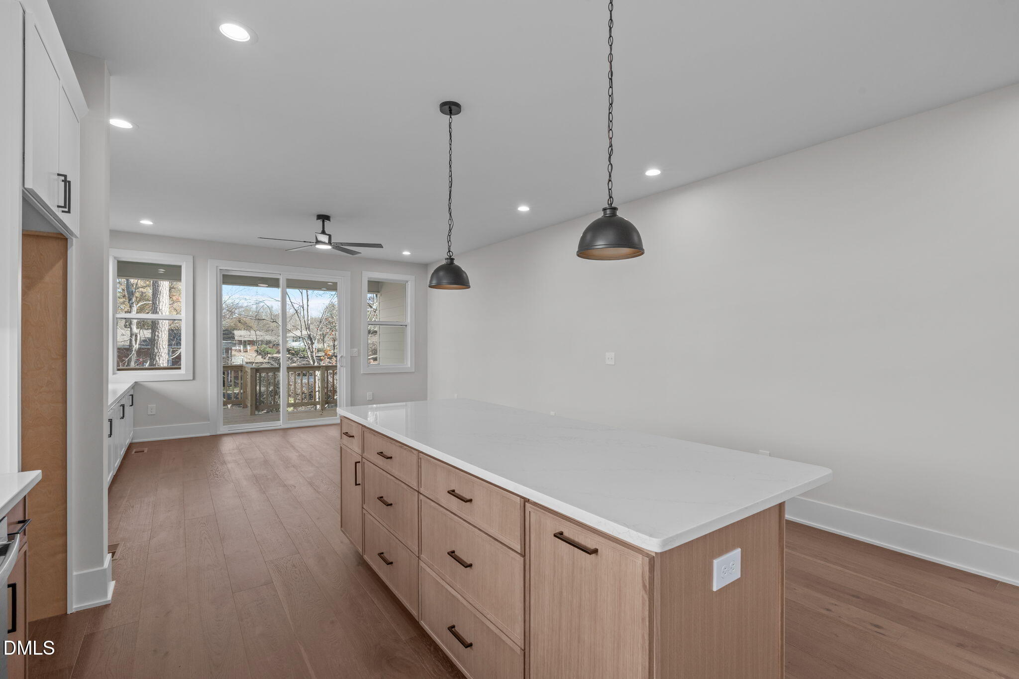 639 Conover Road, Unit A Durham, NC 27703 - Photo 19 of 49 a open kitchen with cabinets and wooden floor