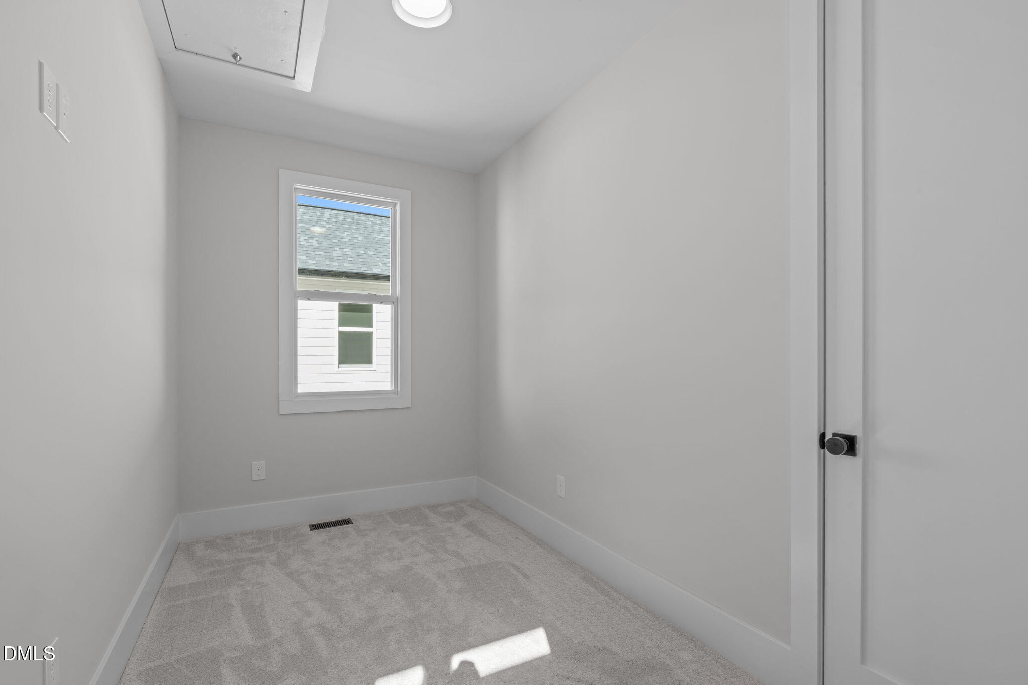 639 Conover Road, Unit A Durham, NC 27703 - Photo 33 of 49 a room that has a window in it