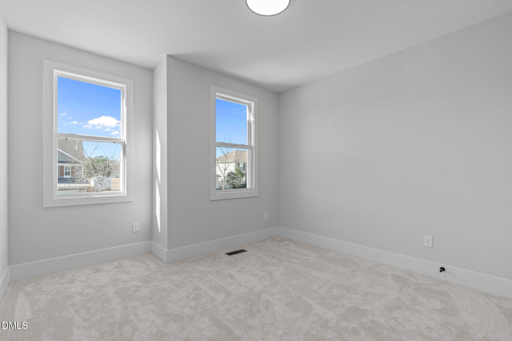 639 Conover Road, Unit A Durham, NC 27703 - Photo 37 of 49 an empty room with windows