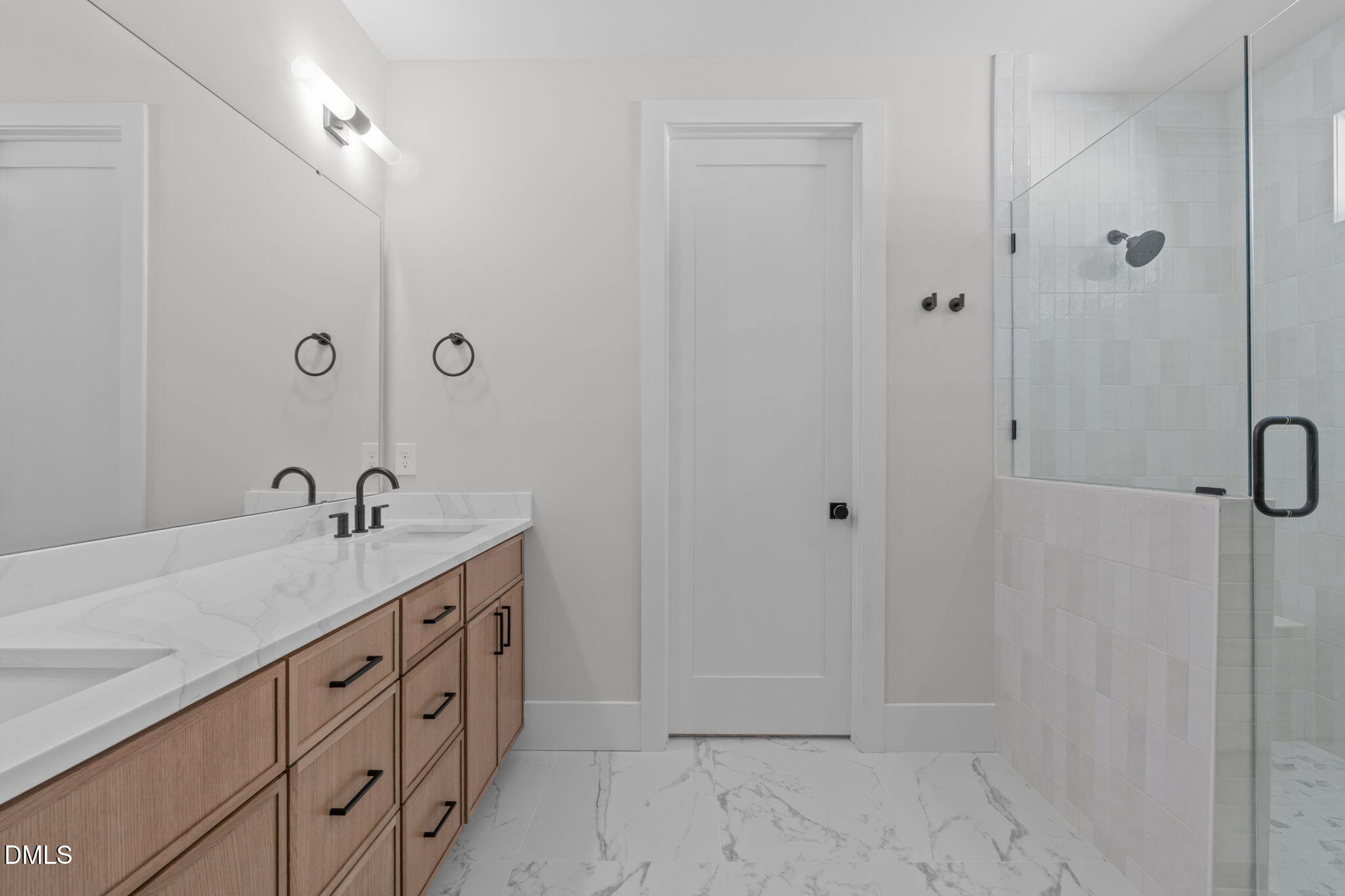 639 Conover Road, Unit A Durham, NC 27703 - Photo 5 of 49 a spacious bathroom with a granite countertop sink and a mirror