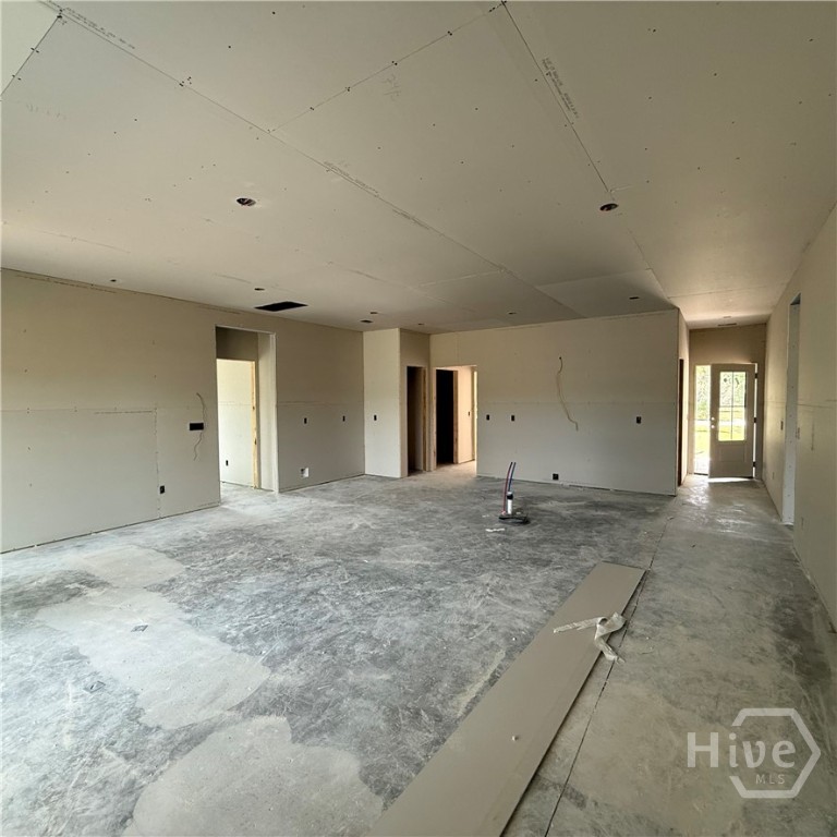 93 Ennis Road Pembroke, GA 31321 - Photo 9 of 36 Great Room, Dining Room, Kitchen. UNDER CONSTRUCTION Progress Photos