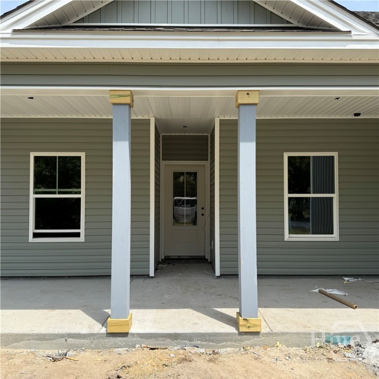 93 Ennis Road Pembroke, GA 31321 - Photo 28 of 36 Covered back Patio. UNDER CONSTRUCTION Progress Photos