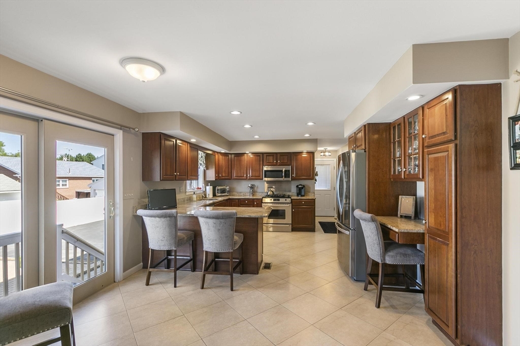 16 Windsor Street Everett, MA 02149 - Photo 11 of 40 a view of a dining room with furniture window and outside view