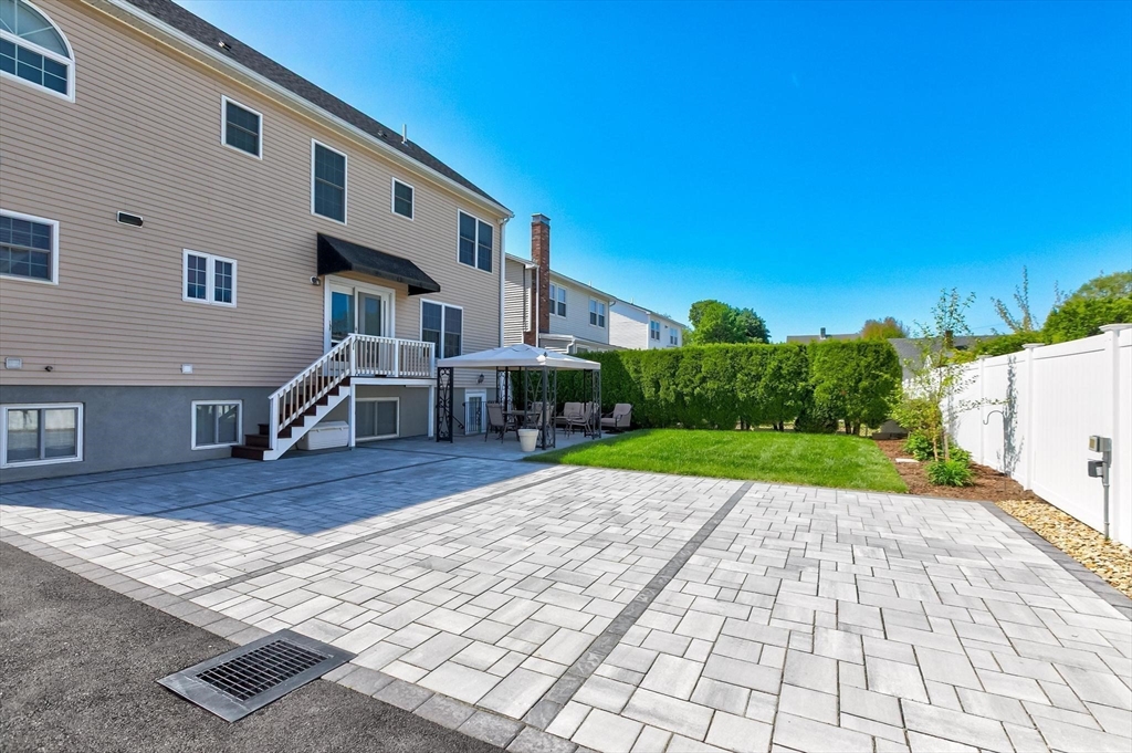 16 Windsor Street Everett, MA 02149 - Photo 32 of 40 a view of a house with wooden floor