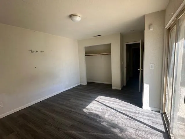 an empty room with closet