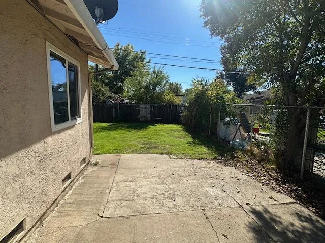 a view of a backyard with a garden