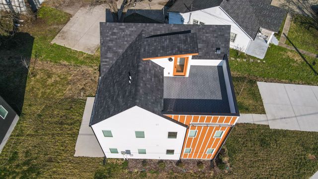 a view of a house with small yard