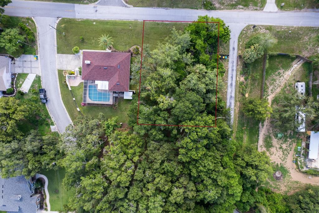 Country Club Road Eustis, FL 32726 - Photo 5 of 8 an aerial view of a house with pool outdoor seating and yard