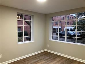 1148 Briarcliff Road Northeast, Unit 1 Atlanta, GA 30306 - Photo 14 of 33 a view of wooden floor in a room