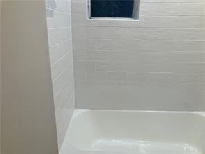 1148 Briarcliff Road Northeast, Unit 1 Atlanta, GA 30306 - Photo 15 of 33 a close up of a bathtub