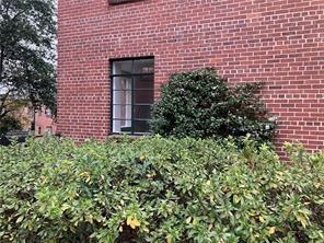 1148 Briarcliff Road Northeast, Unit 1 Atlanta, GA 30306 - Photo 23 of 33 a view of a brick wall