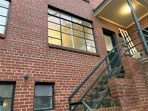 1148 Briarcliff Road Northeast, Unit 1 Atlanta, GA 30306 - Photo 26 of 33 a brick building with a window