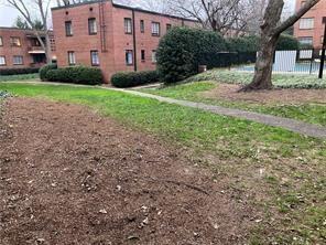 1148 Briarcliff Road Northeast, Unit 1 Atlanta, GA 30306 - Photo 28 of 33 a view of a house with a yard