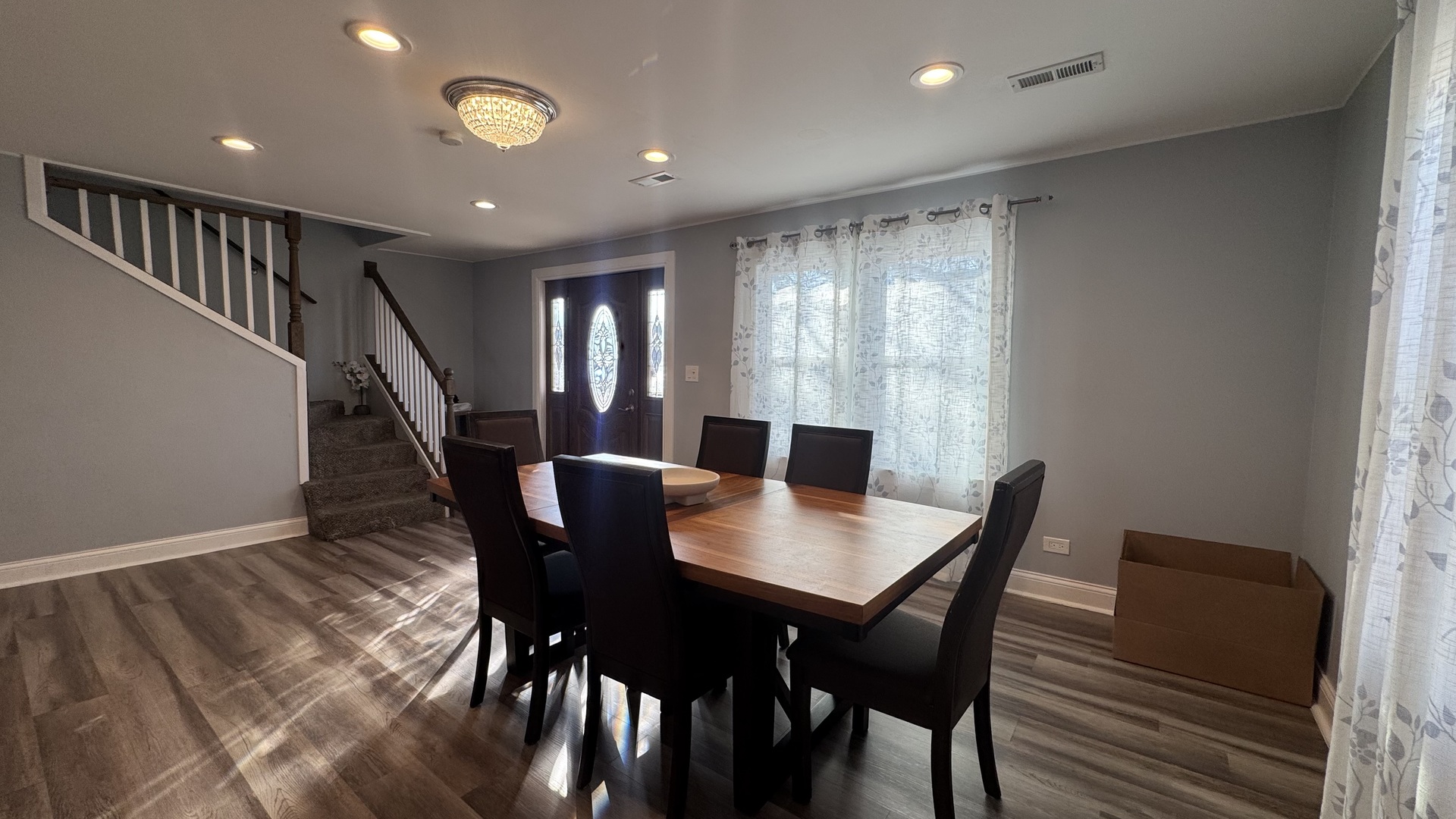 7700 West 83rd Street Bridgeview, IL 60455 - Photo 16 of 37 a view of a dining room with furniture and wooden floor
