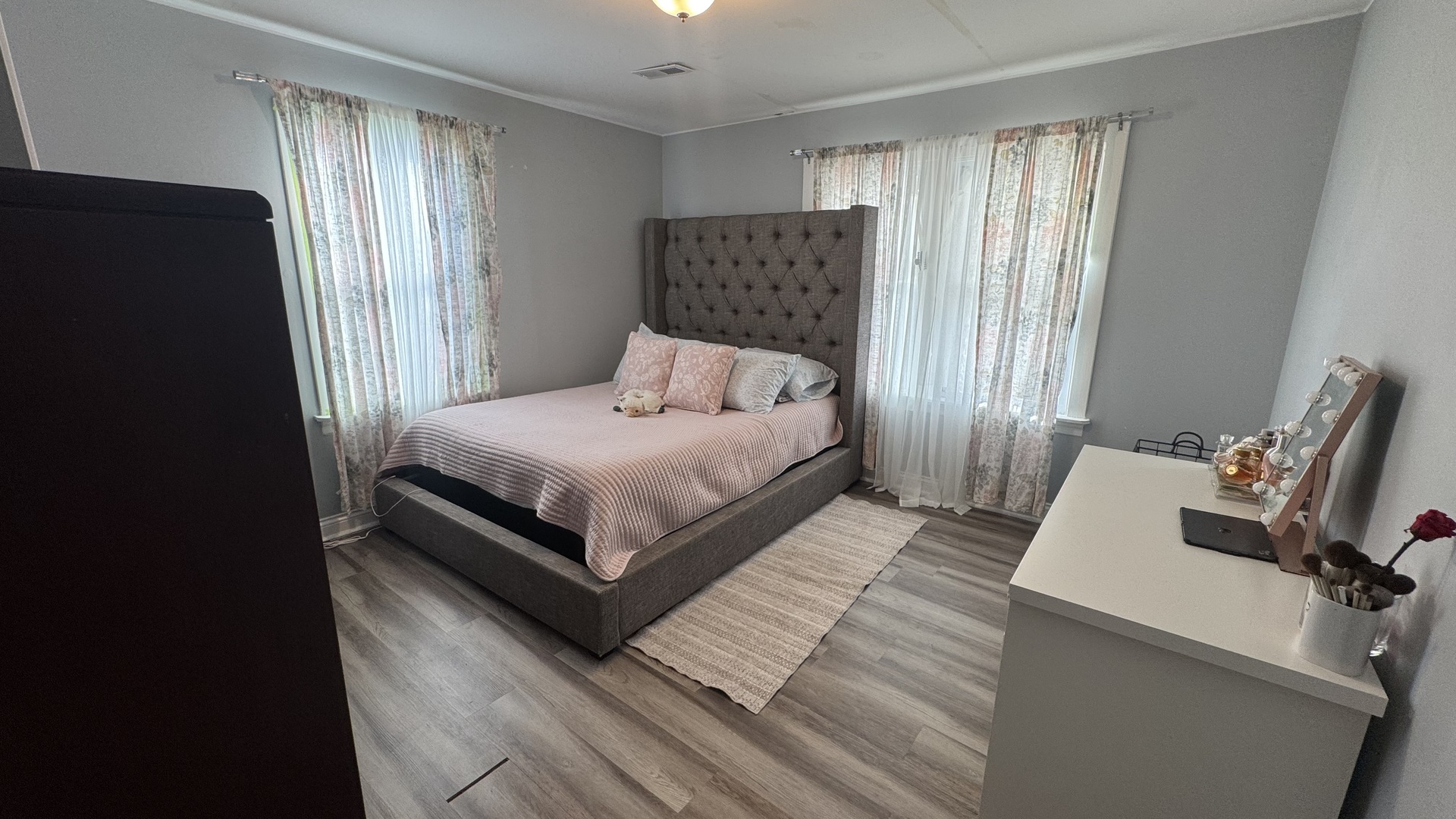 7700 West 83rd Street Bridgeview, IL 60455 - Photo 21 of 37 a bedroom with a bed and wooden floor