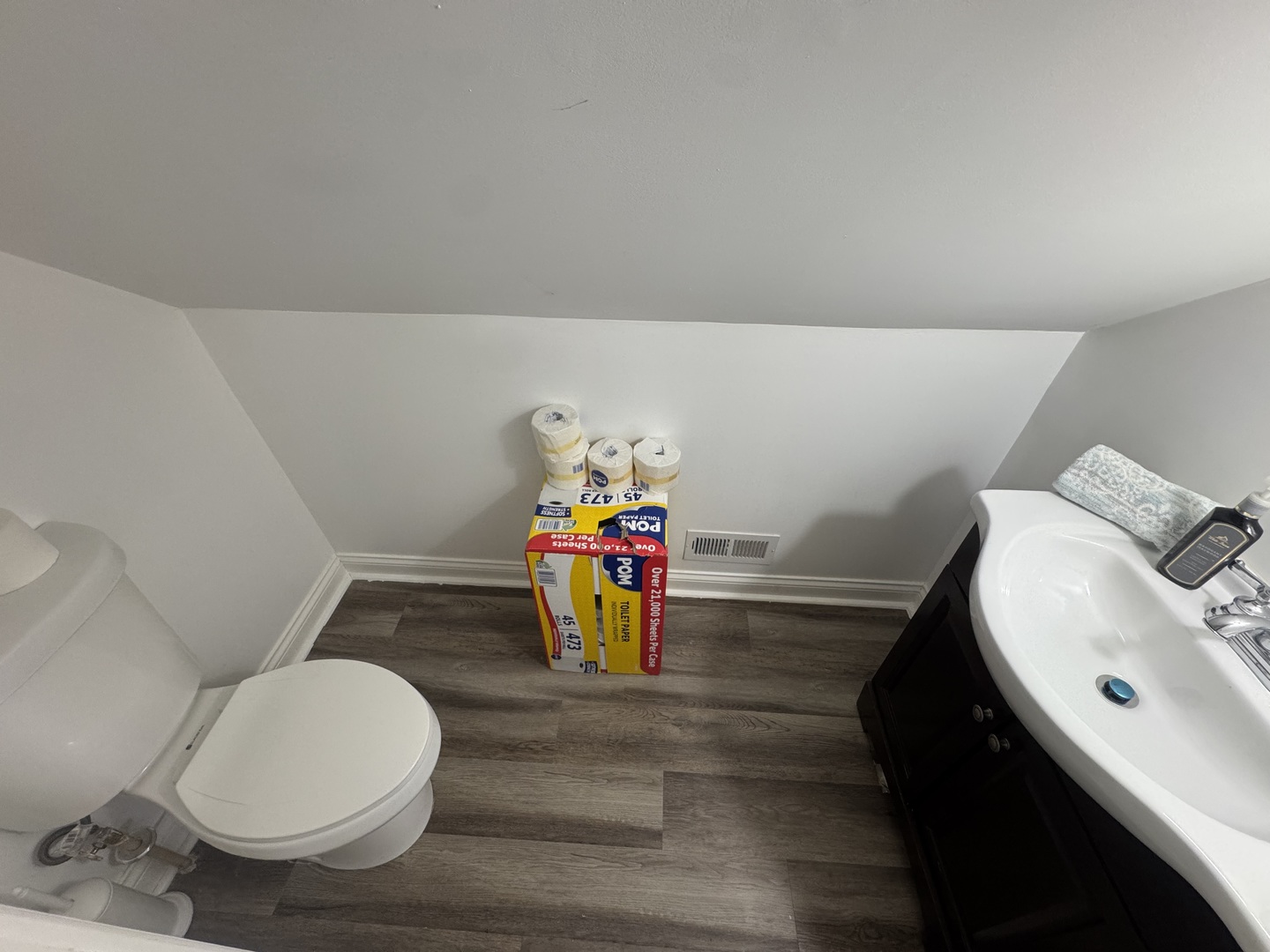 7700 West 83rd Street Bridgeview, IL 60455 - Photo 23 of 37 a bathroom with a sink mirror vanity and toilet