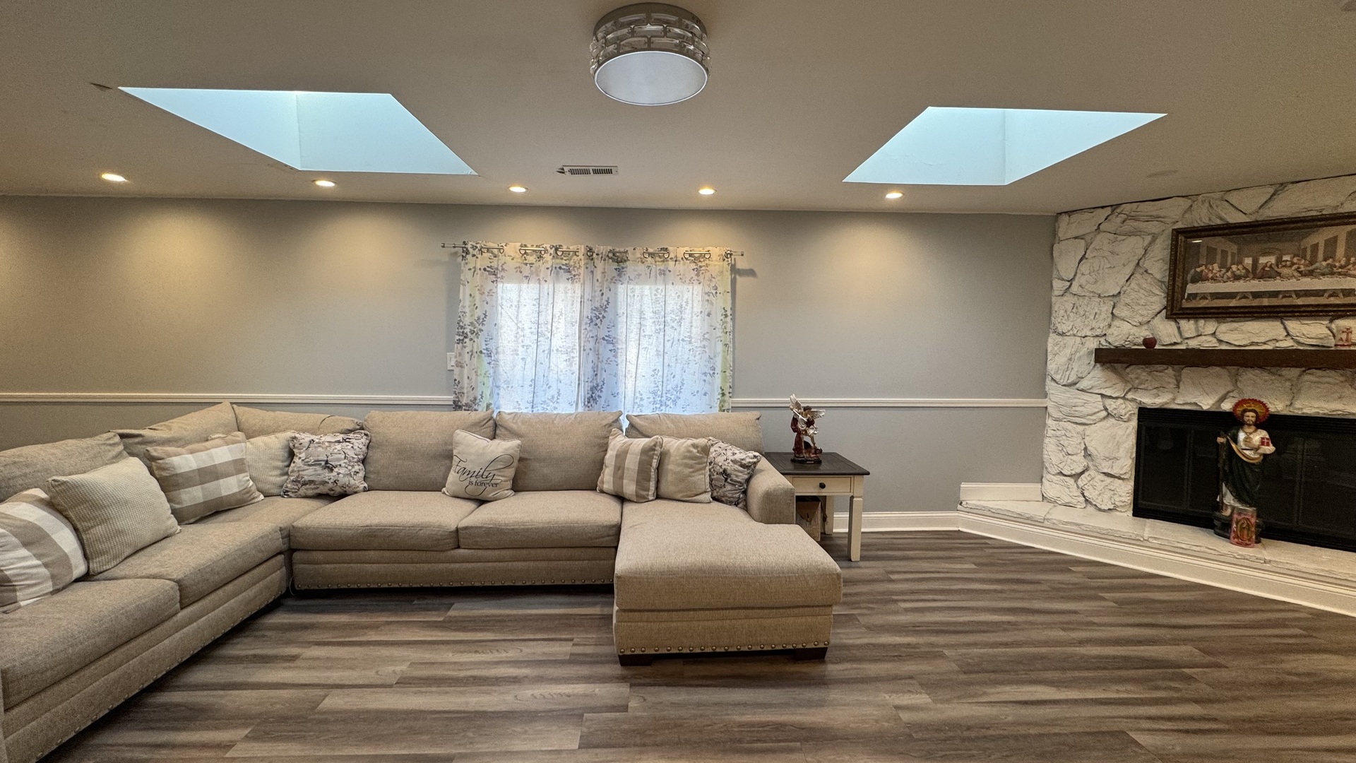 7700 West 83rd Street Bridgeview, IL 60455 - Photo 7 of 37 a living room with furniture and a fireplace
