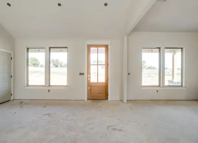 an empty room with a window