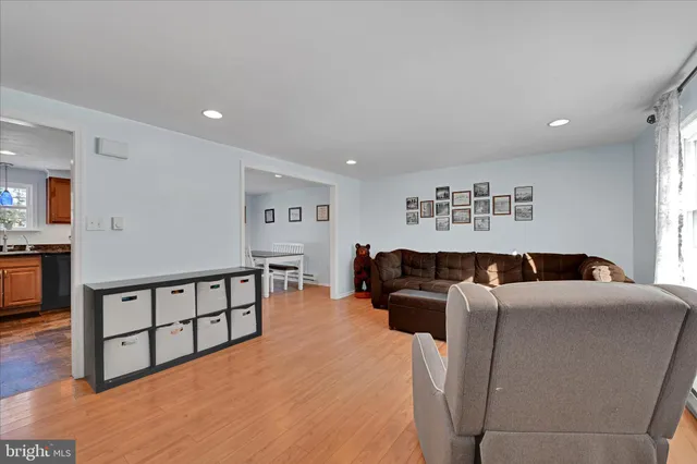 a bed room with furniture and window