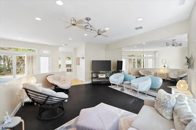 a bathroom with a tub and a shower
