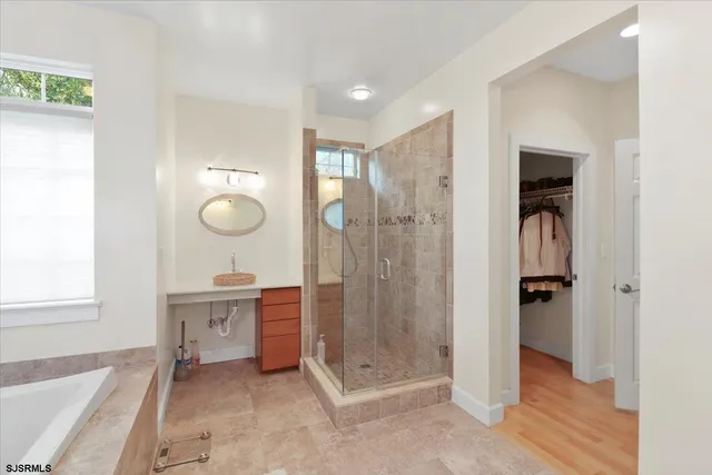 a view of a livingroom with furniture and a view of entryway